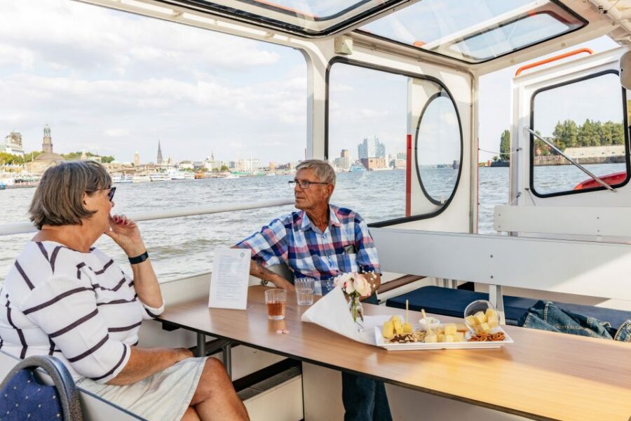 Hamburg: Harbor Cruise with Wine and Cheese - On-Board Comfort: Indoor Heating, Outdoor Views, and Simple Seating