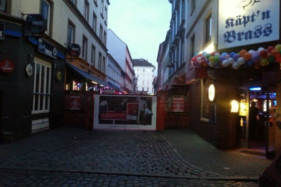Hamburg: St. Pauli Tour with the White Dandy - “Condomium” to Queen Mary: How Stories Turn into Street Knowledge